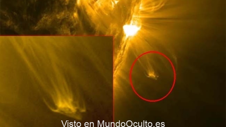 Ufólogos afirman haber descubierto a un «gigantesco OVNI triangular» saliendo del Sol
